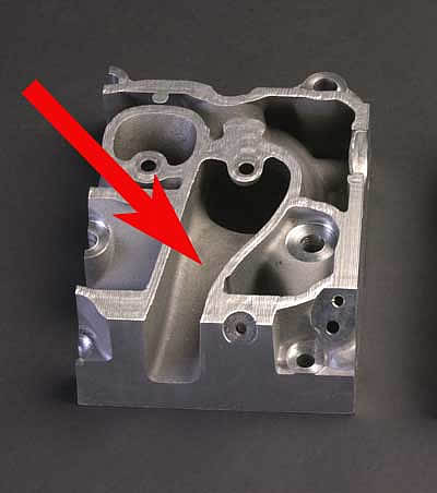 A horizontal saw-cut shows more of the LS2 intake port's uniform cross-sectional area.<br />Image:  GM Communications