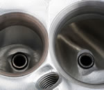 A key development in the early stages of the LS7 head program was going to siamesed valve seats. That unshrouded the intake valve thereby improving airflow.