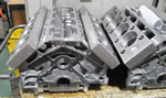 LS7 blocks, with deck plates mounted, await finish honing.