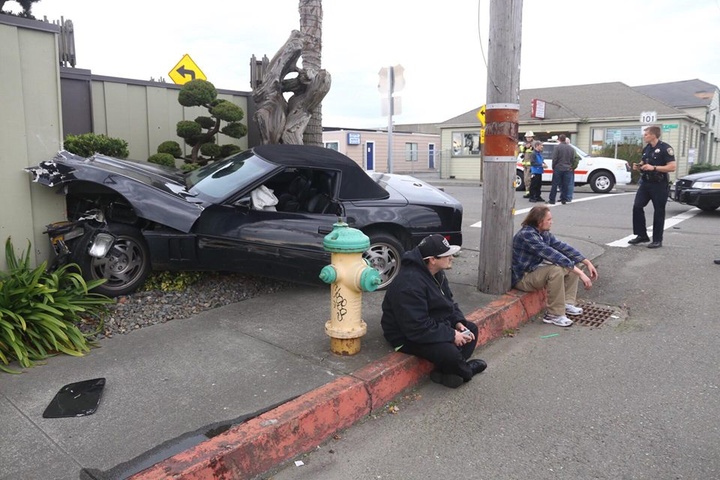 A black Corvette crashed into a Toyota pickup and careened into the fence of a Eureka Best Western Friday afternoon. | Photos by Andrew Goff.