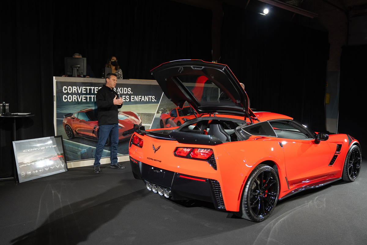 GM Canada President and Managing Director, Scott Bell auctions off the last 7th generation Chevrolet Corvette built for the Canadian market. Photo credit: Bavi Bas