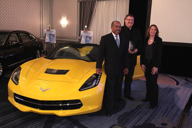 GM’s Ed Welburn, Craig Sass and Helen Emsley pose with the new Corvette | Photo: WardsAuto