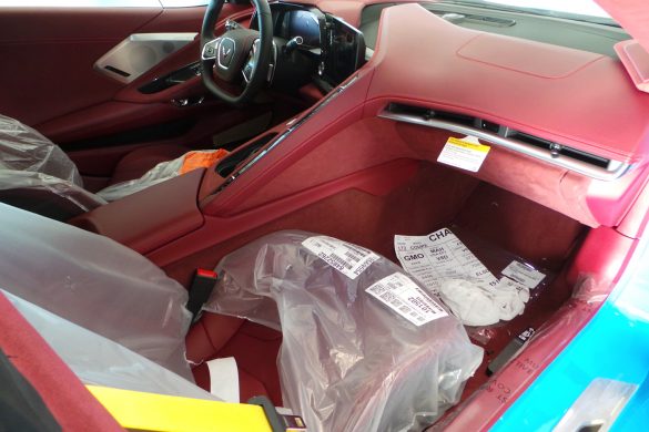 2021 Corvette in Rapid Blue with Morello Red Dipped Interior and Yellow Seat Belts