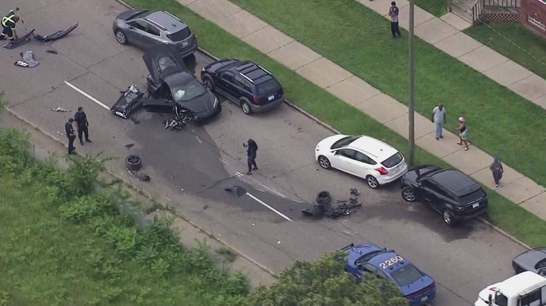 A black Corvette crashed in Detroit after a police chase on July 15, 2021. (WDIV)