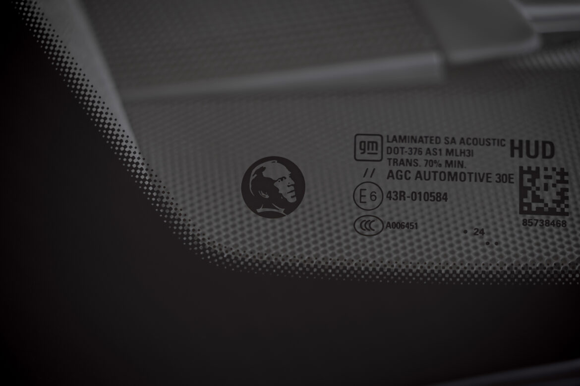 Detail shot of emblem honoring Corvette Executive Chief Engineer Tadge Juechter